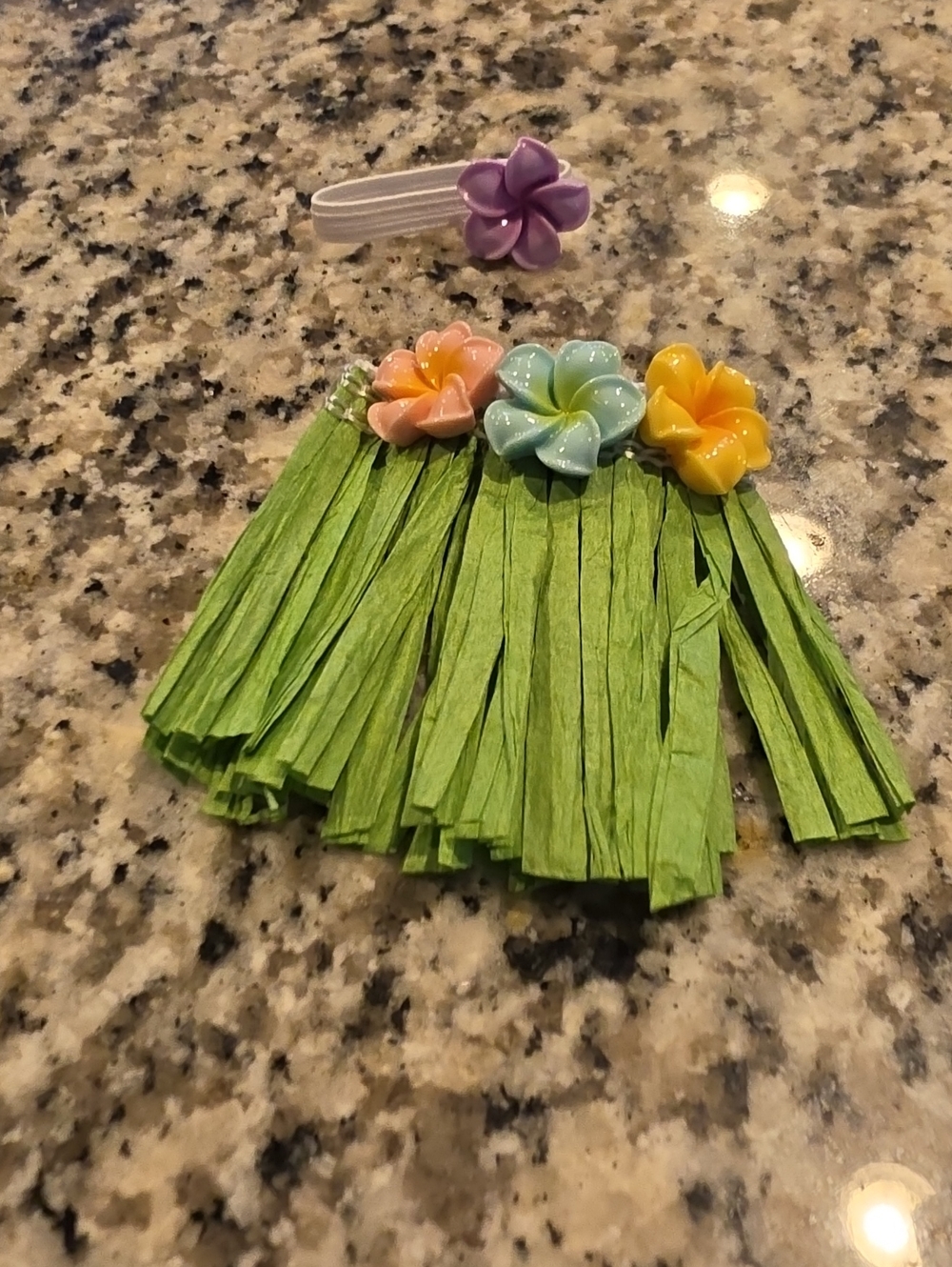 Desk Goose Outfit: Tropical Flower Hula Skirt And Head Band.